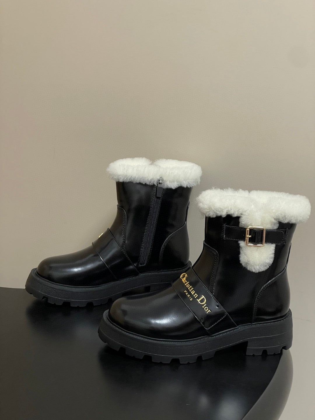 DiorAlps D-Quest Ankle Boots in black grained calfskin with white lambskin shearling