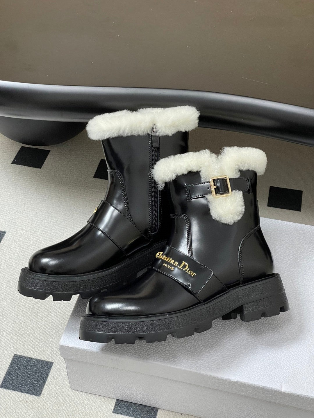 DiorAlps D-Quest Ankle Boots in black grained calfskin with white lambskin shearling