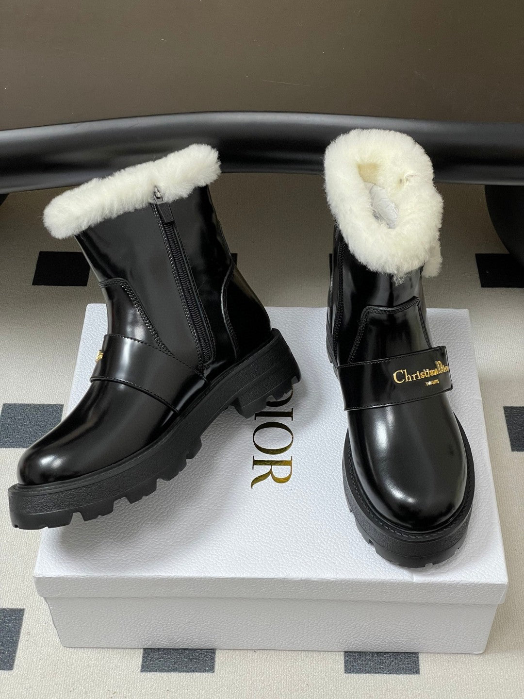 DiorAlps D-Quest Ankle Boots in black grained calfskin with white lambskin shearling