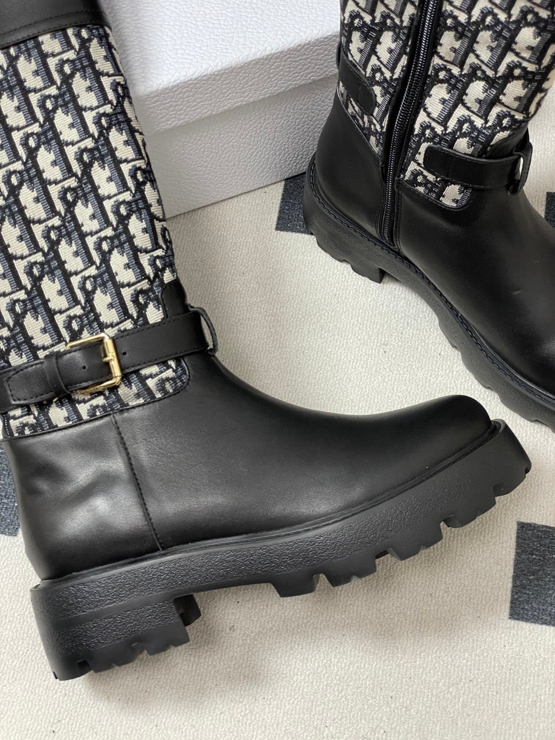 Christian Dior D-Major boots in black calfskin with a black and white Cannage tweed pattern