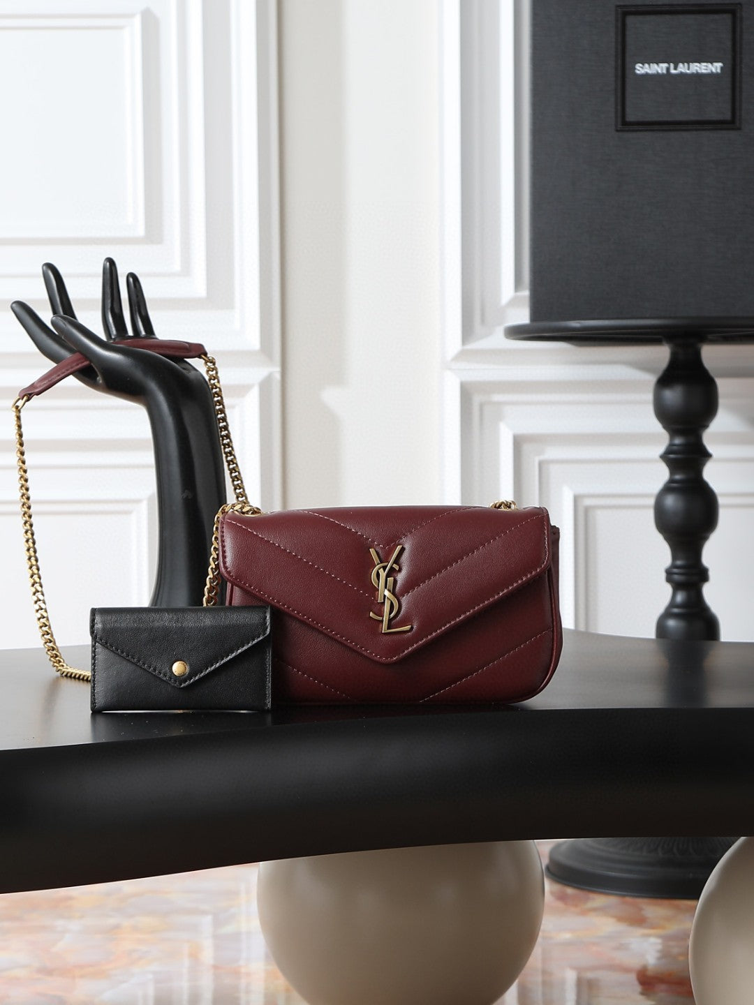Saint Laurent Loulou Mini crossbody bag in the Hot Wine burgundy lambskin leather with gold-toned hardware