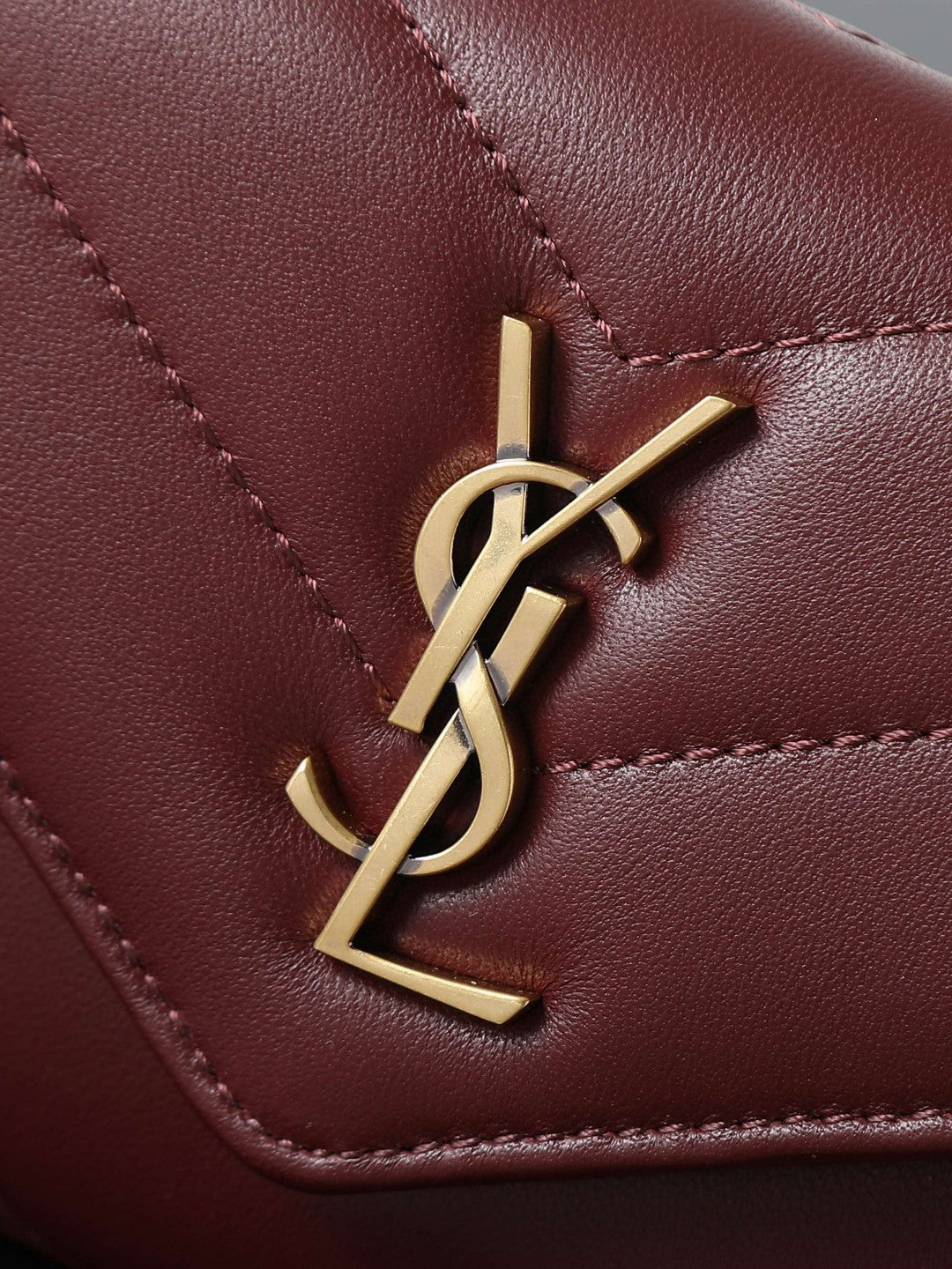 Saint Laurent Loulou Mini crossbody bag in the Hot Wine burgundy lambskin leather with gold-toned hardware
