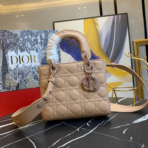 black Dior Lady Dior bag in cannage lambskin leather.