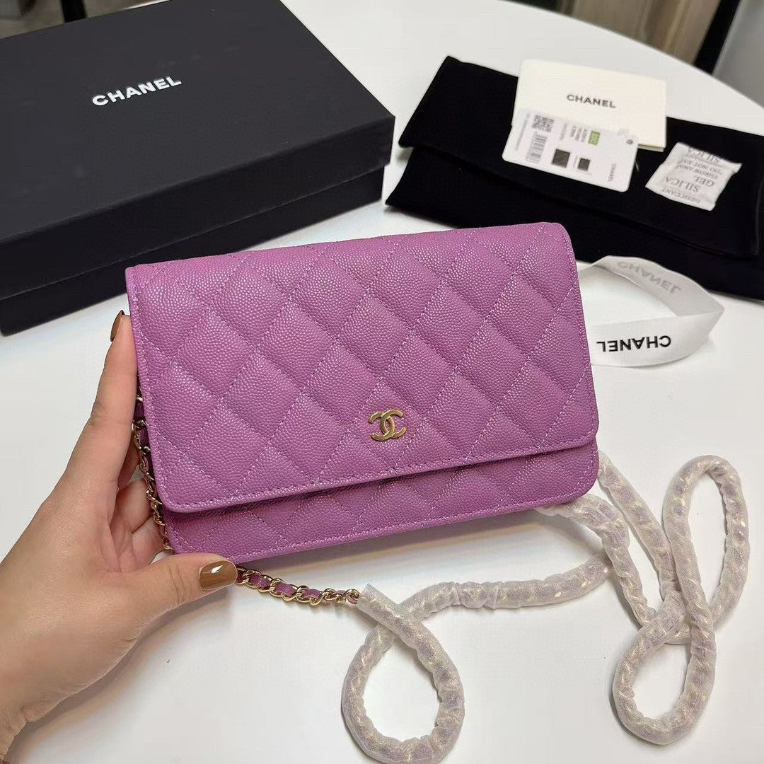 Chanel Wallet on Chain (WOC) bag in red caviar leather with gold-tone hardware