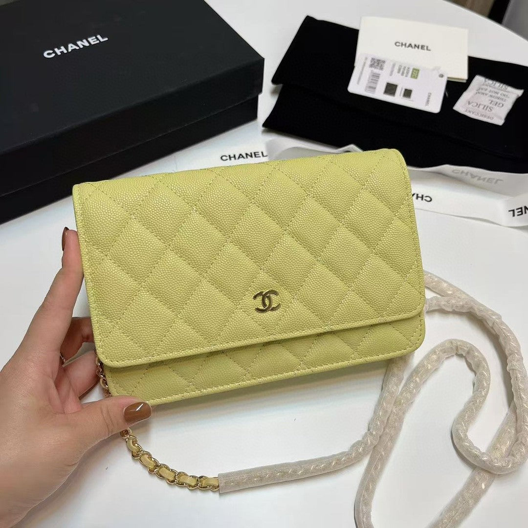 Chanel Wallet on Chain (WOC) bag in red caviar leather with gold-tone hardware