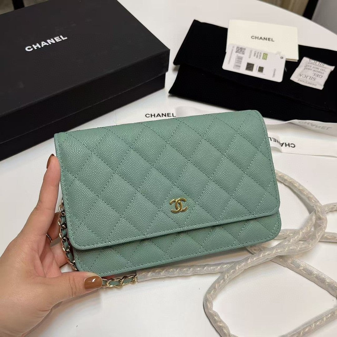 Chanel Wallet on Chain (WOC) bag in red caviar leather with gold-tone hardware