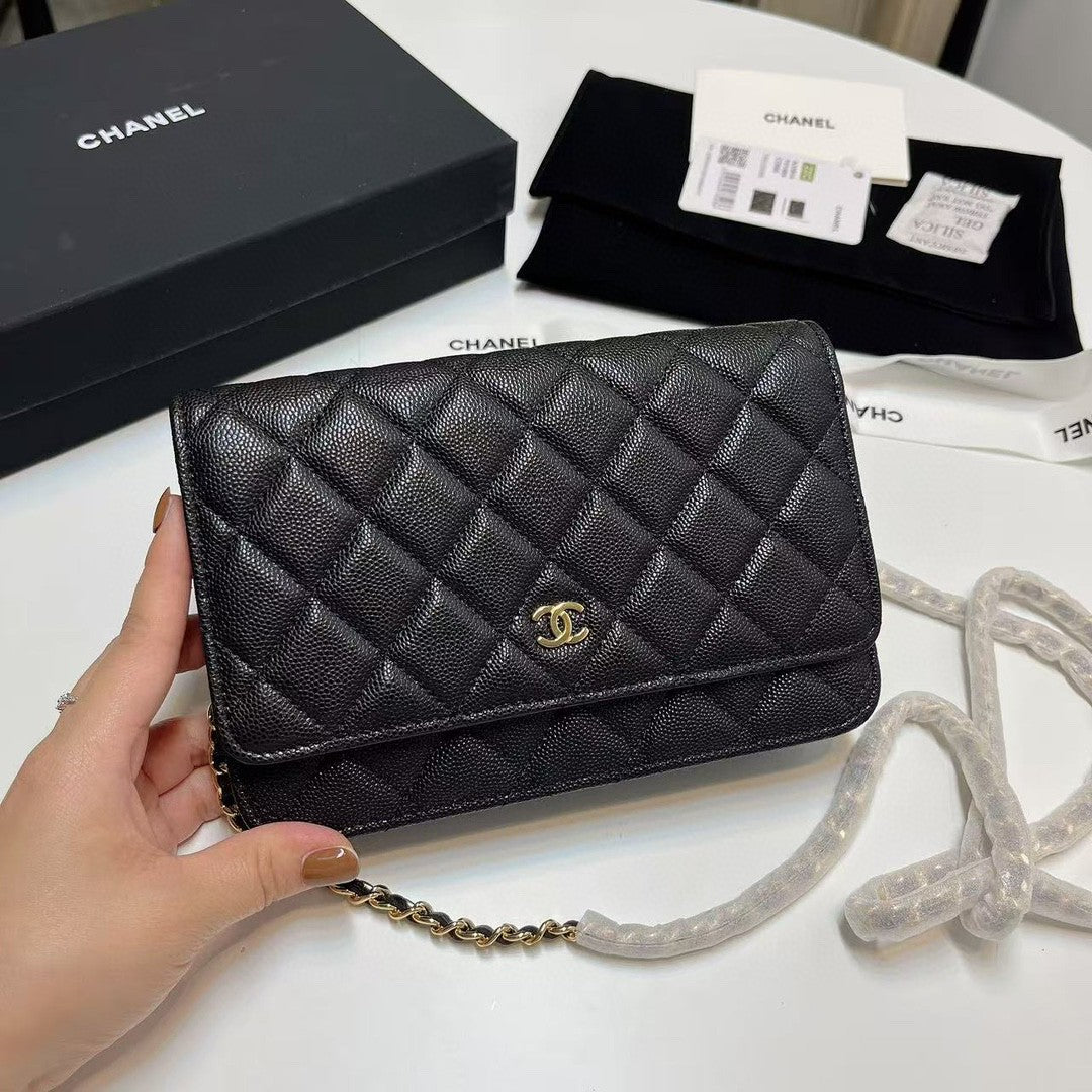 Chanel Wallet on Chain (WOC) bag in red caviar leather with gold-tone hardware