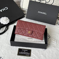 Chanel Classic Long Flap Wallet in black caviar leather with gold-tone hardware