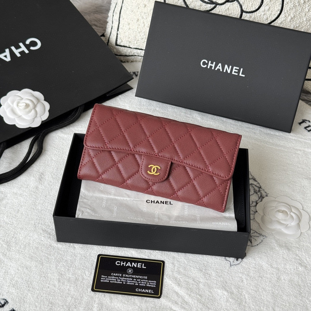 Chanel Classic Long Flap Wallet in black caviar leather with gold-tone hardware