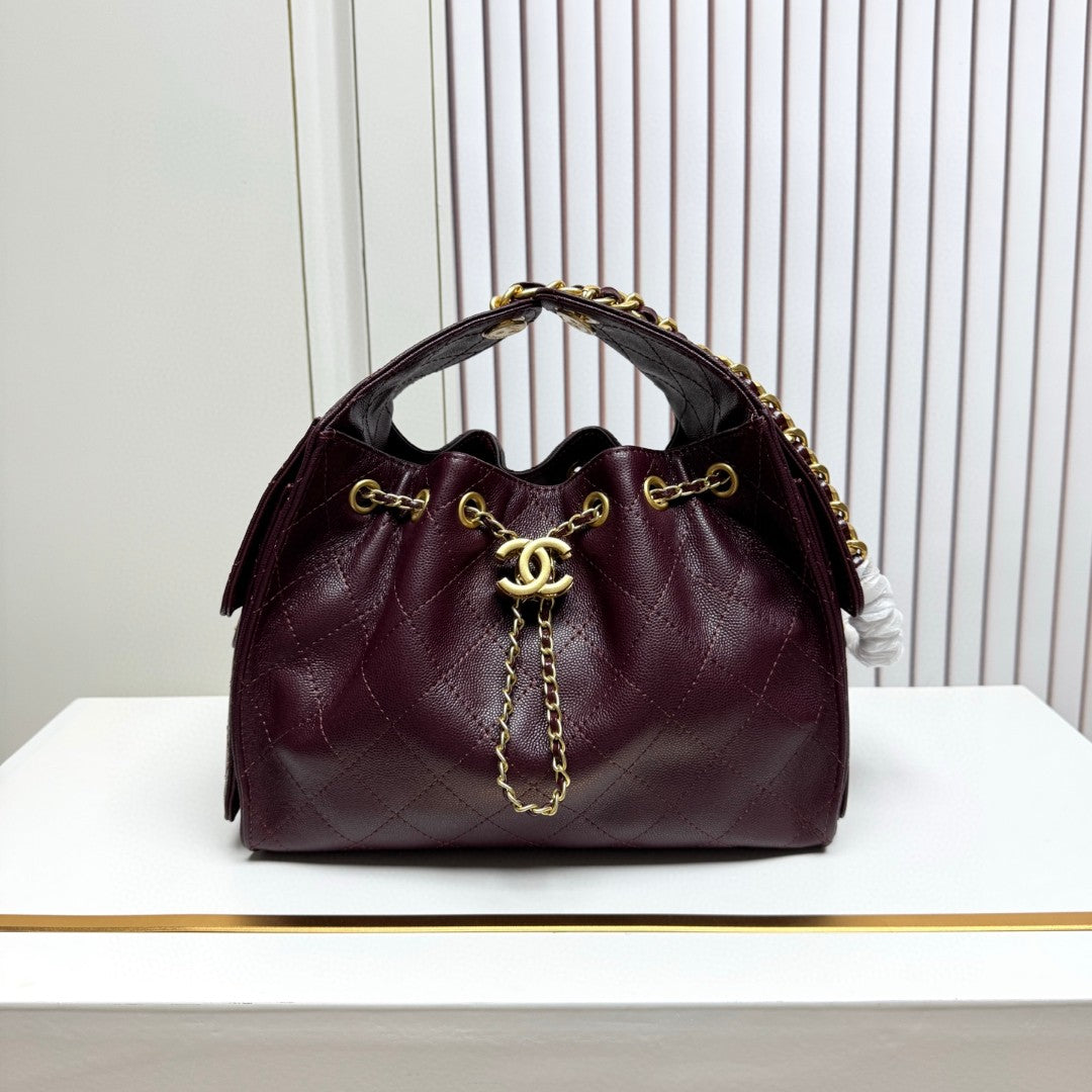 Chanel 25 Small Hobo Bag in black caviar leather with antique gold-tone hardware