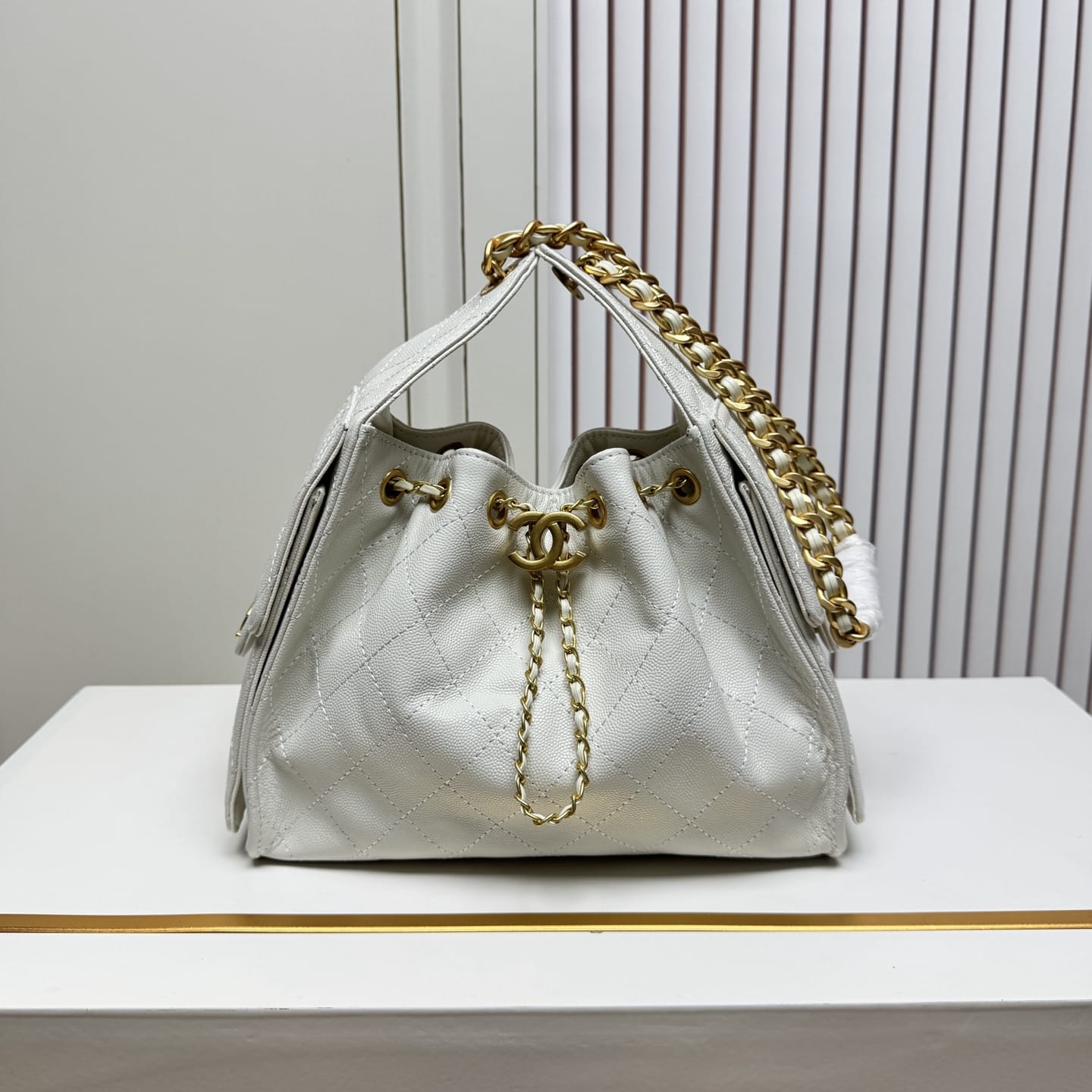 Chanel 25 Small Hobo Bag in black caviar leather with antique gold-tone hardware