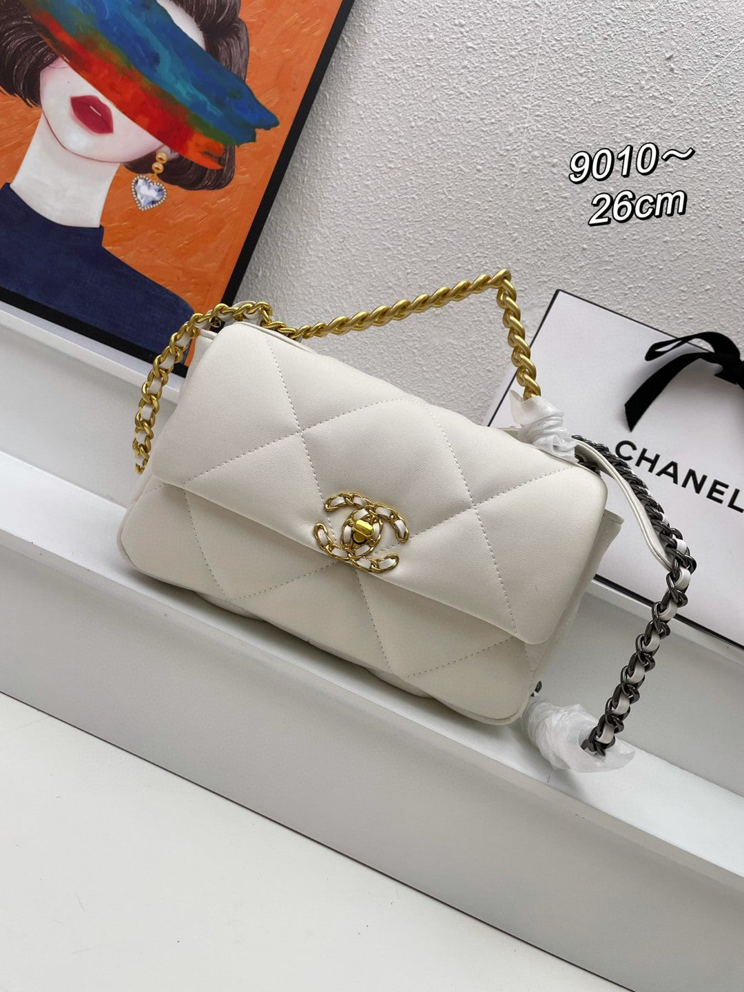 black Chanel 19 flap bag in lambskin with gold-tone