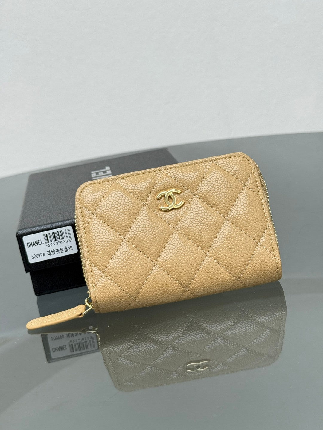Chanel Classic Zipped Coin Purse in black quilted caviar leather with gold-tone hardware