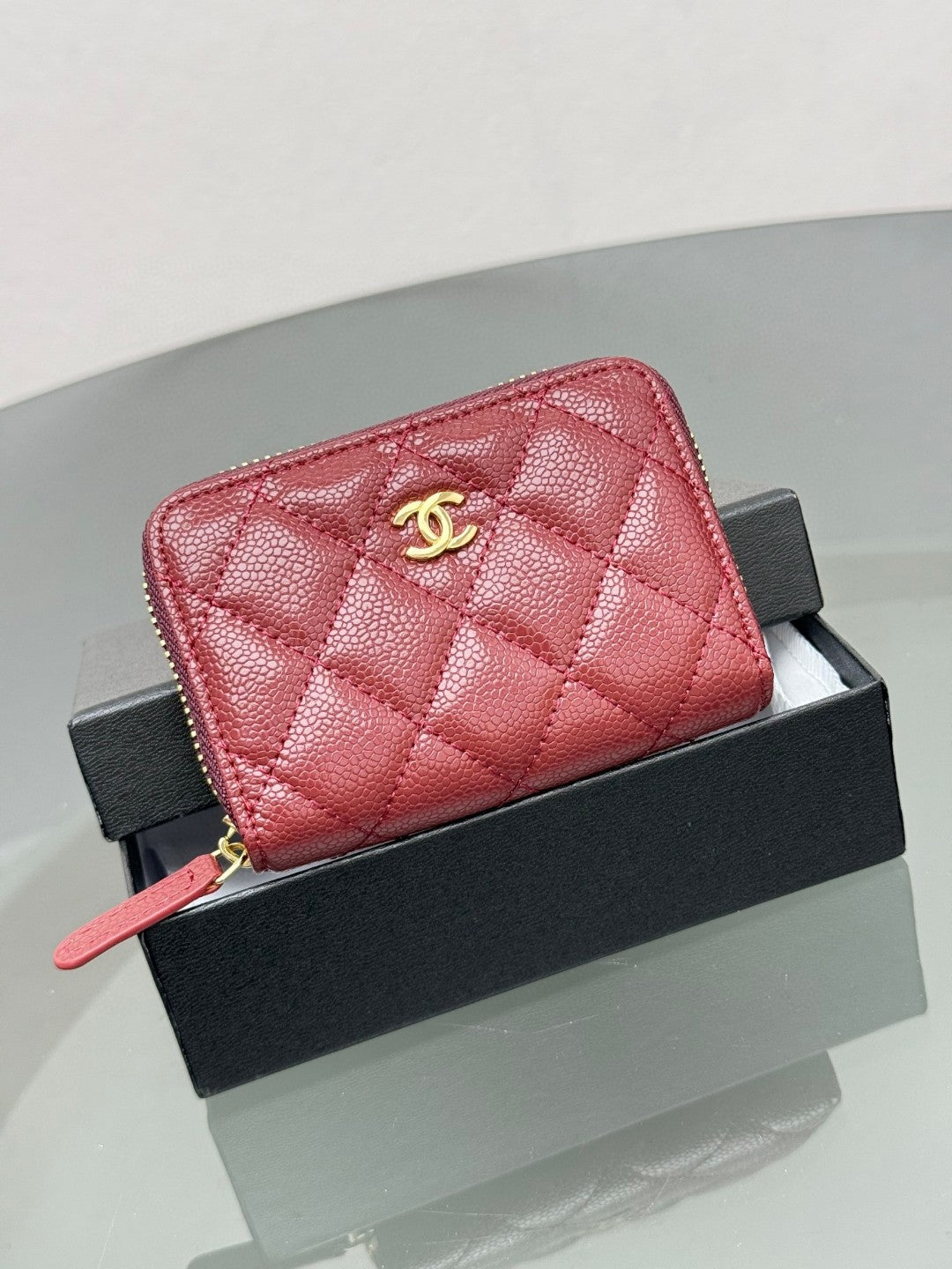 Chanel Classic Zipped Coin Purse in black quilted caviar leather with gold-tone hardware