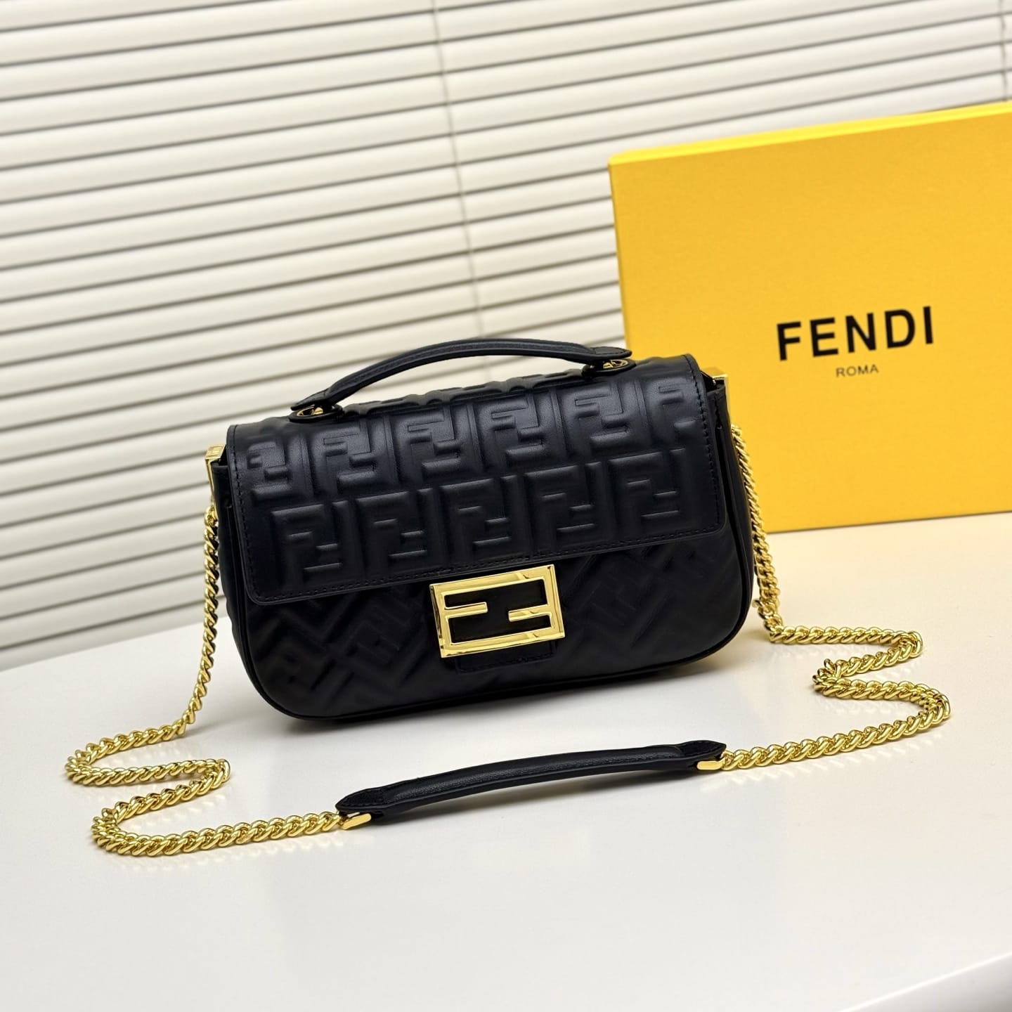 Fendi red FF embossed leather Midi Chain Baguette bag