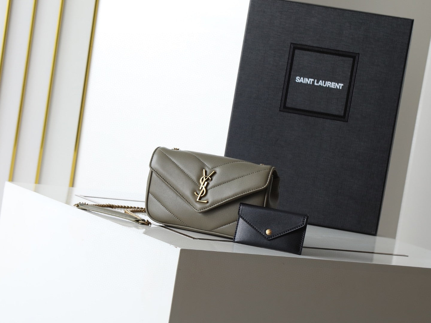 Saint Laurent Loulou mini chain bag in black chevron-quilted lambskin