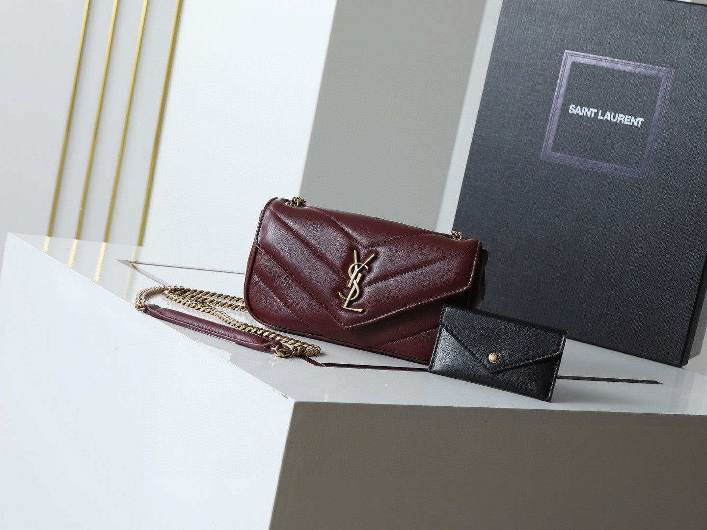 Saint Laurent Loulou mini chain bag in black chevron-quilted lambskin